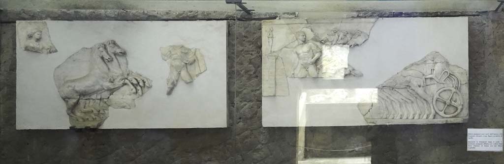 V.8 Herculaneum. August 2021. Room 7, fragments displayed on south wall. Photo courtesy of Robert Hanson.
